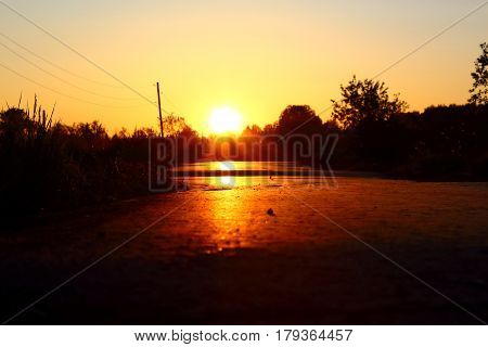 The beginning of a new journey. Sunrise on the road