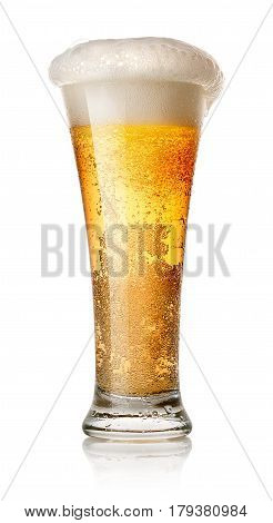 Light beer in a glass isolated on white
