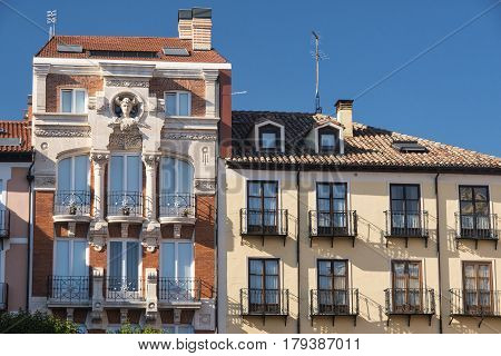 Burgos (Castilla y Leon Spain): facade of historic building with balconies in the Plaza Mayor