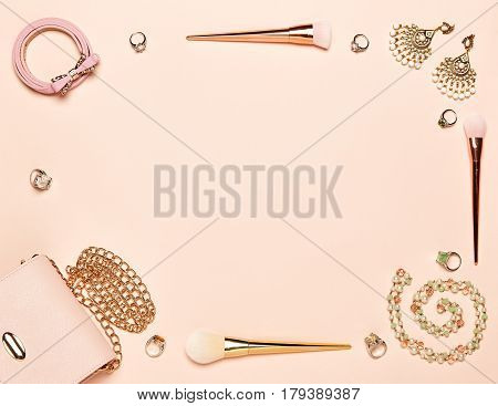 Fashion lady accessories set. Falt Lay. Stylish handbag. Make-Up brushes. Jewelry. Women accessories. Trendy fashion design