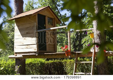 Wooden play house built in a tree