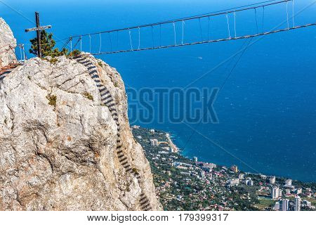 The rope bridge on the Mount Ai-Petri in Crimea, Russia. Ai-Petri is one of the highest mountains in the Crimea and tourist attraction. 