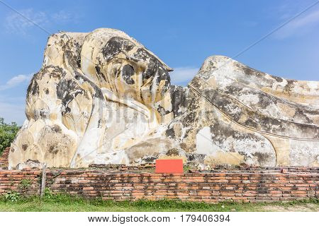 Principal Buddha statue Reclining Buddha at Wat Lokayasutharam Ayutthaya Historical Park Ayutthaya Thailand.
