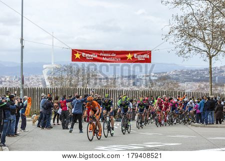 Barcelona Spain - March27 2016: The peloton riding during Volta Ciclista a Catalunya on the top of Montjuic in Bracelona Spain on March 27 2016.