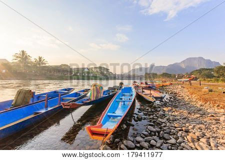 long tail boats in Song river at Vang Vieng Laos.