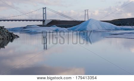 Iceland Jakulsalon lagoon in winter season with bridge crossing natural landscape background