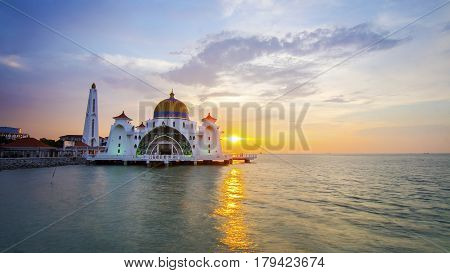 Majestic view of Malacca Straits Mosque during sunset.