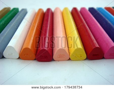 Multiple crayon color sticks back side view