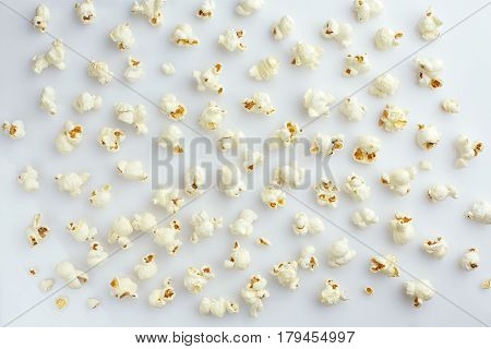 Tasty salted popcorn isolated on white background