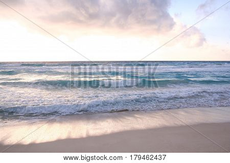 Sunrise in the beautiful sea shore in Cancun Mexico