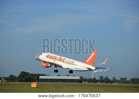 Amsterdam the Netherlands - June 9th 2016: G-EZWY easyJet Airbus A320-214(WL) takeoff from Polderbaan runway destination Basel Switzerland