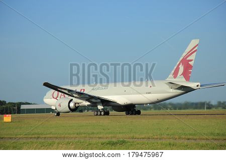 Amsterdam the Netherlands - June 9th 2016: A7-BFC Qatar Airways Cargo Boeing 777-FDZ takeoff from Polderbaan runway destination Doha Qatar