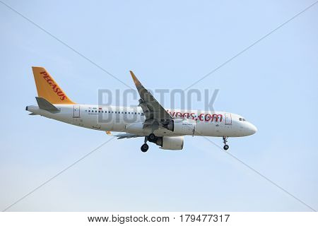 Amsterdam the Netherlands - March 31st 2017: TC-NBI Pegasus Airbus A320neo approaching Polderbaan runway at Schiphol Amsterdam Airport the Netherlands