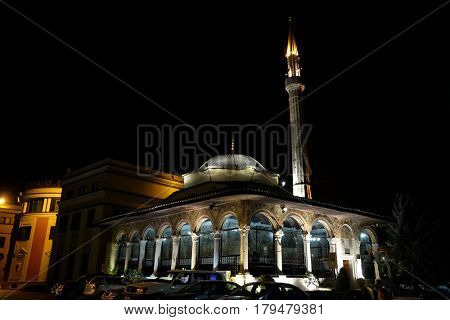 TIRANA, ALBANIA - SEPTEMBER 27: The Et'hem Bey Mosque at night on Skanderbeg Square, Tirana, Albania on September 27, 2016.