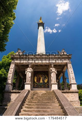 Monument And Golden Angel Of Peace In The Center Of The Capital Of Bavaria.