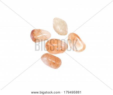 Extra high quality tumbled citrine crystals from Brazil isolated on white background