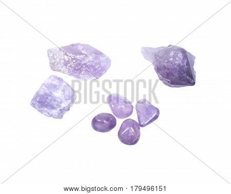 Amethyst: tumbled, natural chunks, single point isolated on white background
