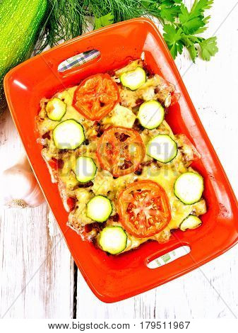 Casserole From Minced Meat And Zucchini In Brazier On Board Top