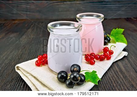 Milk Cocktail With Black And Red Currant On Napkin