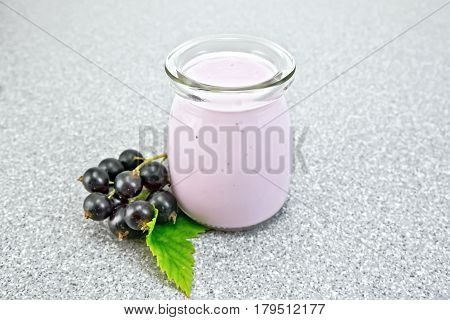Milk Cocktail With Black Currant In Jar On Granite Table