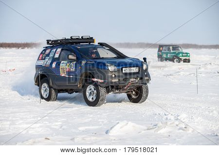 KHABAROVSK RUSSIA - JANUARY 28 2017: Isuzu Vehicross riding on snow during local championship
