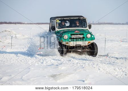 KHABAROVSK RUSSIA - JANUARY 28 2017: UAZ 469 riding on snow during local championship