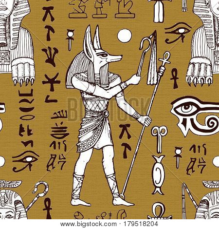Seamless textured background with Anubis, Sphinx and ancient Egyptian symbols. May be used as wrapping paper, textile design