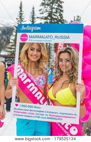 Two Young Happy Pretty Women In Colorful Bikini With Instagram Frame.