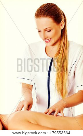 Woman having massage of body in the spa salon. Beauty treatment concept.