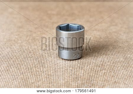 Hex head 22. Hex head for screwdriver. To tool loosening screws bolts and nuts. Picture for illustration a collage.