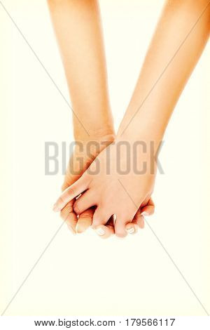 Hands of woman holding together.