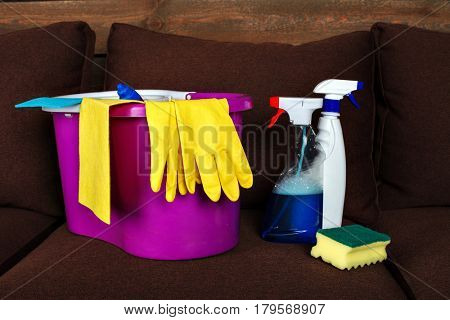 Cleaning servisce supplies in a busket, closeup