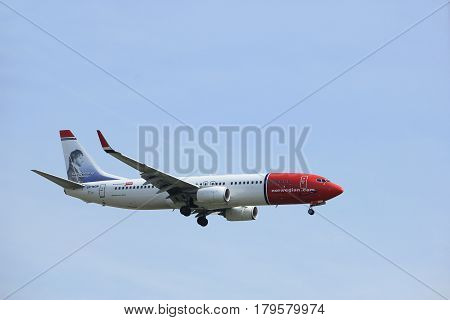 Amsterdam the Netherlands - March 31st 2017: LN-NGN Norwegian Air Shuttle Boeing 737 approaching Polderbaan runway at Schiphol Amsterdam Airport the Netherlands