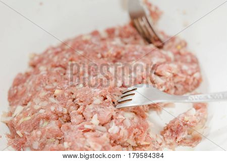 Fresh Meat Is Overwound On Forcemeat.