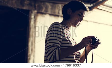 Woman traveler photographer holiday lifestyle trip