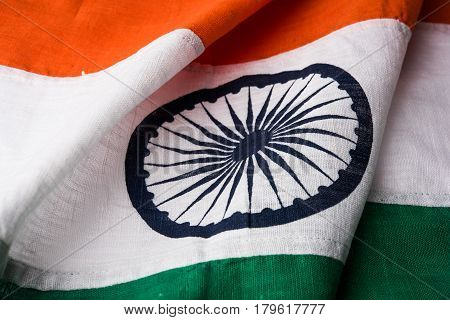 Closeup picture of indian flag made up of pure cotton or khadi, showing texture, selective focus