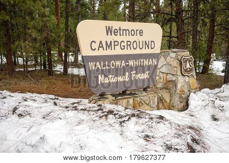 Fresh snow stands around the Wetmore Campground sign in Wallowa-Whitman National Forest