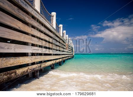 Wooden slats of a pier in the  Caribbean sea