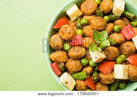 Soya chunks 65 or soya chunk fry is a healthy snack, easy to cook, protein rich, vegetarian dish ideal for starters. popular indian food. selective focus