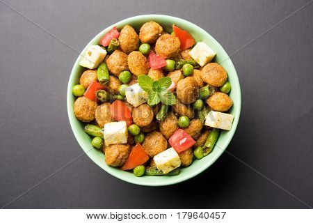 Soya chunks 65 or soya chunk fry is a healthy snack, easy to cook, protein rich, vegetarian dish ideal for starters. popular indian food. selective focus