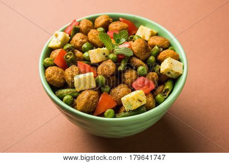 Soya chunks 65 or soya chunk fry is a healthy snack, easy to cook, protein rich, vegetarian dish ideal for starters. popular indian food. selective focus
