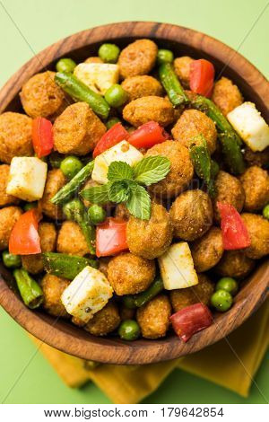 Soya chunks 65 or soya chunk fry is a healthy snack, easy to cook, protein rich, vegetarian dish ideal for starters. popular indian food. selective focus