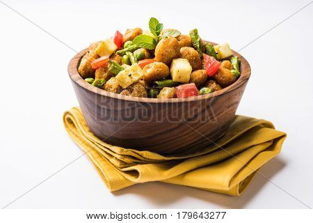 Soya chunks 65 or soya chunk fry is a healthy snack, easy to cook, protein rich, vegetarian dish ideal for starters. popular indian food. selective focus