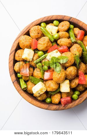 Soya chunks 65 or soya chunk fry is a healthy snack, easy to cook, protein rich, vegetarian dish ideal for starters. popular indian food. selective focus