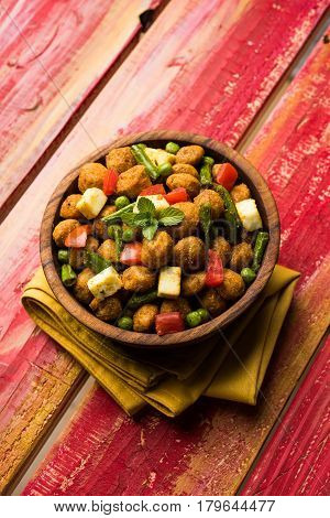Soya chunks 65 or soya chunk fry is a healthy snack, easy to cook, protein rich, vegetarian dish ideal for starters. popular indian food. selective focus
