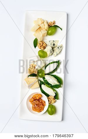 Various cheese type dish served luxery. Top view, white background, isolated.