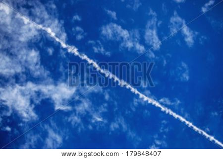 Line of the plane on blue sky in blurred for background