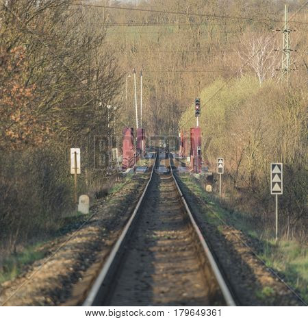 Railway track and bridge in Bakov nad Jizerou area with sunrise