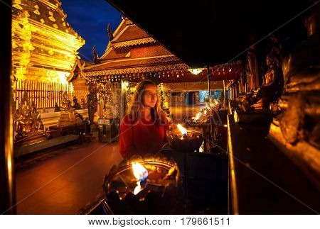 Woman In Buddhist Temple