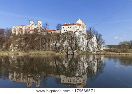 Benedictine abbey in Tyniec near Krakow reflection in the water Poland